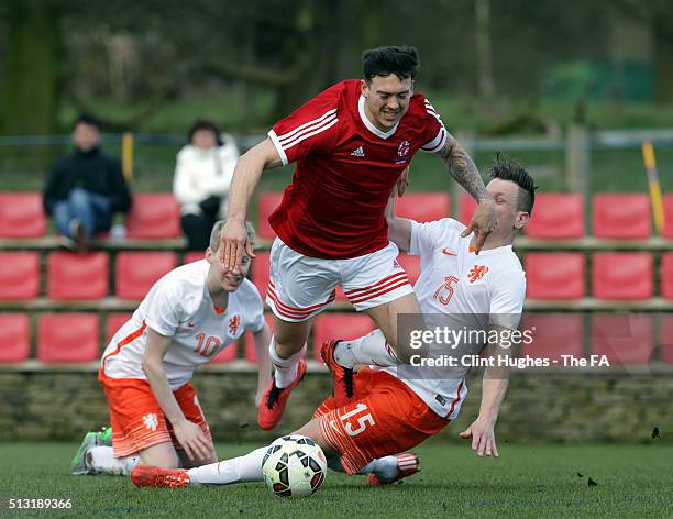 Jack Rutter of Great Britain is tackled by Joey Mense of Netherlands during the CP Tri Nations Tournament match between Great Britain and Netherlands...