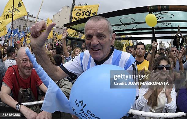 Supporters of Argentine President Mauricio Macri cvheer during the inauguration of the 134th period of ordinary sessions at the Congress in Buenos...