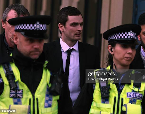 Footballer Adam Johnson leaves Bradford Crown Court during day thirteen of the trial where he is facing child sexual assault charges on March 1, 2016...