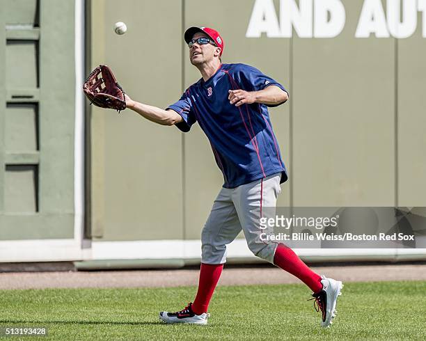 David Murphy of the Boston Red Sox fields a fly ball during a team workout on March 1, 2016 at Fenway South in Fort Myers, Florida .