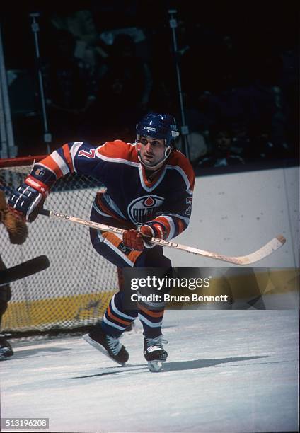 Canadian hockey player Paul Coffey of the Edmonton Oilers in action against the New York islanders at Nassau Coliseum, Uniondale, New York, February...