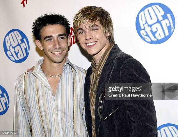 Actor Frankie Galasso poses for a photo with singer Jesse McCartney at Popstar! Magazine's album release party for McCartney's new CD "Beautiful...