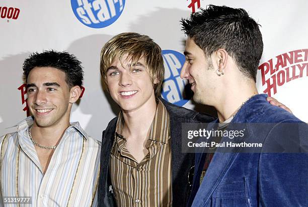 Actor Frankie Galasso , singer Jesse McCartney, and singer Greg Raposo pose at Popstar! Magazine's album release party for McCartney's new CD...