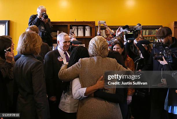 Democratic presidential candidate former Secretary of State Hillary Clinton greets patrons at Mapps Coffee on March 1, 2016 in Minneapolis,...