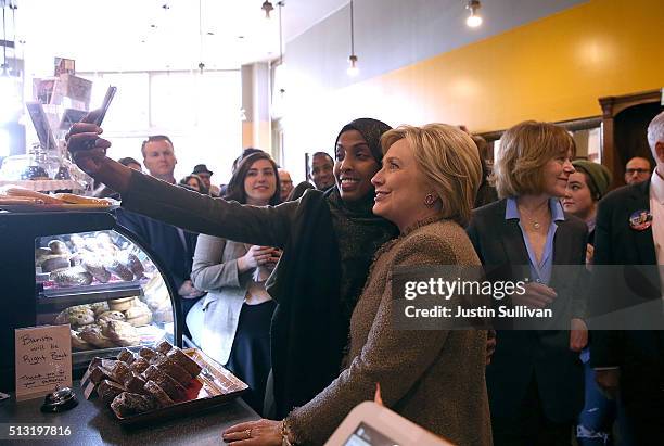 Democratic presidential candidate former Secretary of State Hillary Clinton greets patrons at Mapps Coffee on March 1, 2016 in Minneapolis,...