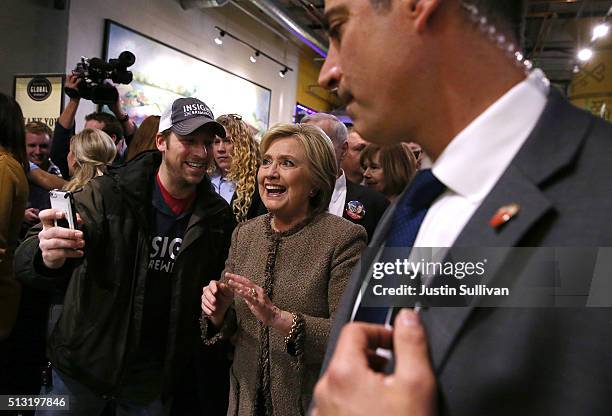 Democratic presidential candidate former Secretary of State Hillary Clinton greets patrons at Midtown Global Market on March 1, 2016 in Minneapolis,...