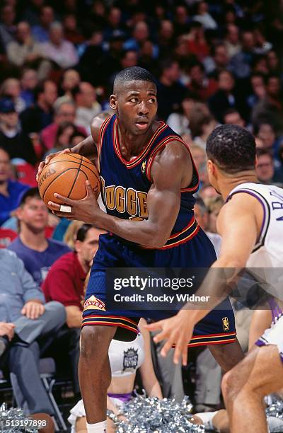 Anthony Goldwire of the Denver Nuggets dribbles against the Sacramento Kings circa 1997 at Arco Arena in Sacramento, California. NOTE TO USER: User...