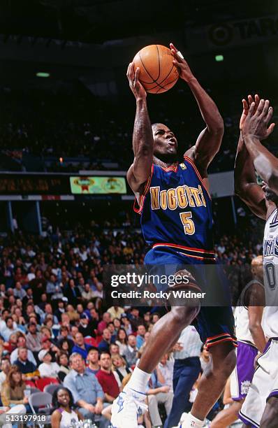Anthony Goldwire of the Denver Nuggets shoots against the Sacramento Kings circa 1997 at Arco Arena in Sacramento, California. NOTE TO USER: User...