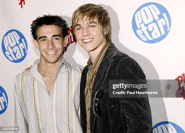 Actor Frankie Galasso poses for a photo with singer Jesse McCartney at Popstar! Magazine's album release party for McCartney's new CD "Beautiful...