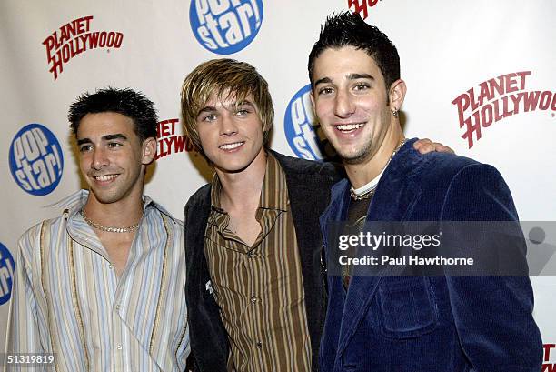 Actor Frankie Galasso , singer Jesse McCartney, and singer Greg Raposo pose at Popstar! Magazine's album release party for McCartney's new CD...