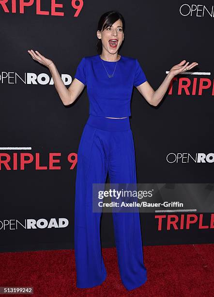 Actress Perrey Reeves arrives at the premiere of Open Road's 'Triple 9' at Regal Cinemas L.A. Live on February 16, 2016 in Los Angeles, California.