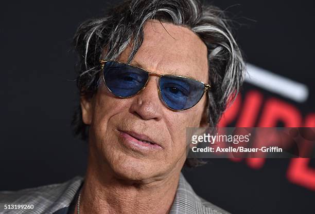 Actor Mickey Rourke arrives at the premiere of Open Road's 'Triple 9' at Regal Cinemas L.A. Live on February 16, 2016 in Los Angeles, California.