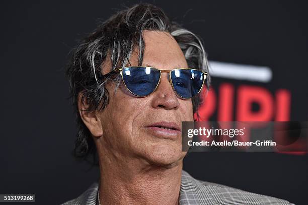 Actor Mickey Rourke arrives at the premiere of Open Road's 'Triple 9' at Regal Cinemas L.A. Live on February 16, 2016 in Los Angeles, California.