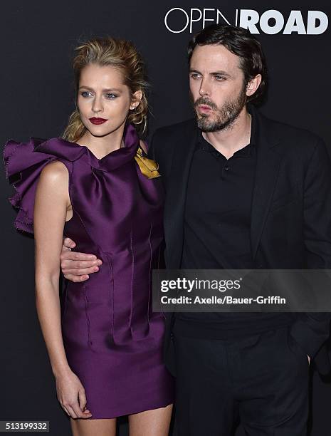 Actors Teresa Palmer and Casey Affleck arrive at the premiere of Open Road's 'Triple 9' at Regal Cinemas L.A. Live on February 16, 2016 in Los...