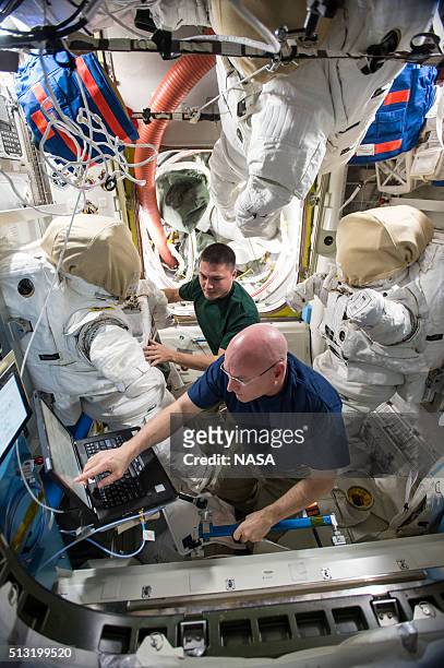 In this handout photo provided by NASA, US astronauts Scott Kelly and Kjell Lindgren are counting down to a pair of spacewalks, now targeted for Oct....