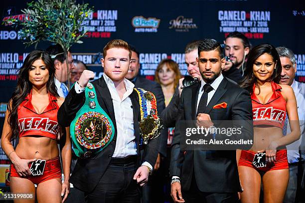 Canelo Alvarez and Amir Khan pose for photos during a press event at the Hard Rock Cafe on March 1, 2016 in New York City.