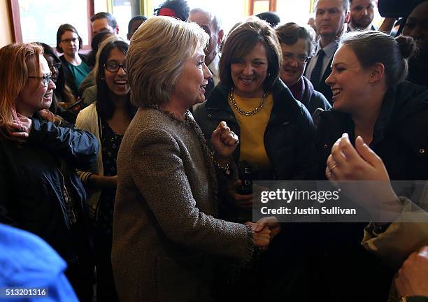 Democratic presidential candidate former Secretary of State Hillary Clinton greets patrons at Mapps Coffee on March 1, 2016 in Minneapolis,...