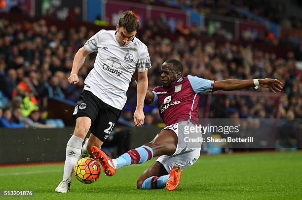 Seamus Coleman of Everton is tackled by Aly Cissokho of Aston Villa during the Barclays Premier League match between Aston Villa and Everton at Villa...