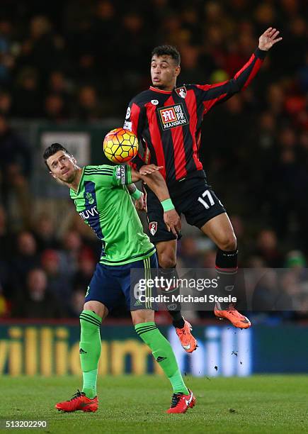 Joshua King of Bournemouth and Jose Fonte of Southampton compete for the ball during the Barclays Premier League match between A.F.C. Bournemouth and...