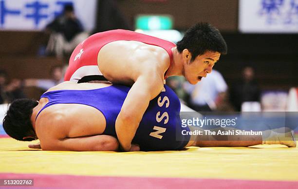 Shingo Matsumoto and Norikatsu Saikawa compete in the Men's Greco-Roman -84kg final during day two of the All Japan Wrestling Championships at the...