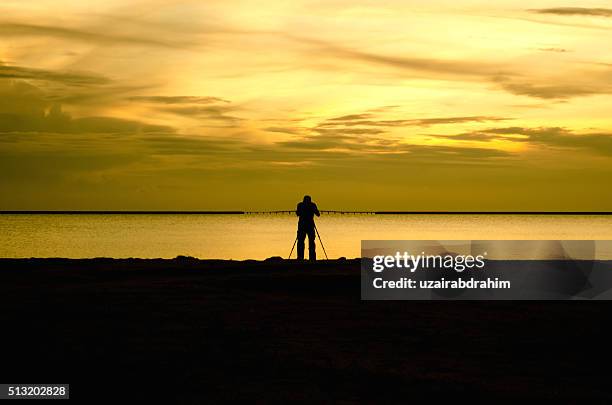 the photographer - pantai kok stock pictures, royalty-free photos & images