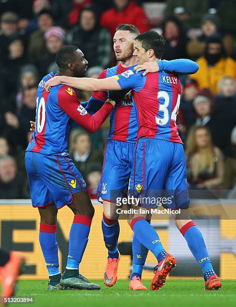 Connor Wickham of Crystal Palace celebrates scoring his team's first goal with his team mates Yannick Bolasie and Martin Kelly during the Barclays...