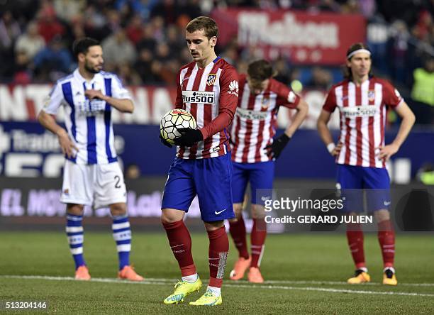 Atletico Madrid's French forward Antoine Griezmann prepares to kick a penalty during the Spanish league football match Club Atletico de Madrid vs...