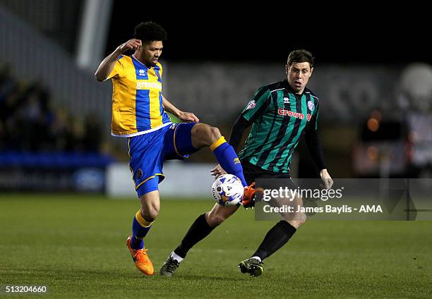 Nat Knight-Percival of Shrewsbury Town and Grant Holt of Rochdale during the Sky Bet League One match between Shrewsbury Town and Rochdale at New...