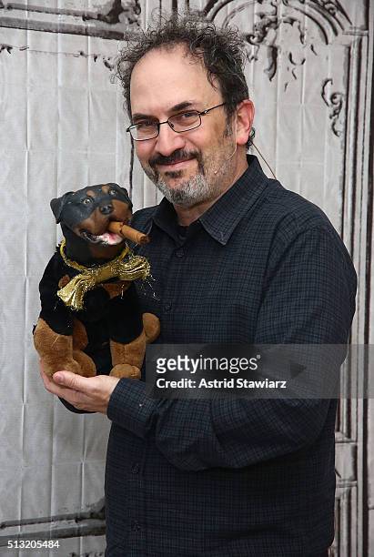 Actor Robert Smigel poses with 'Triumph the Insult Comic Dog' during AOL Build Presents "Triumph's Election Special 2016" at AOL Studios In New York...