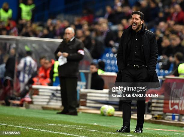 Atletico Madrid's Argentinian coach Diego Simeone shouts during the Spanish league football match Club Atletico de Madrid vs Real Sociedad de Futbol...