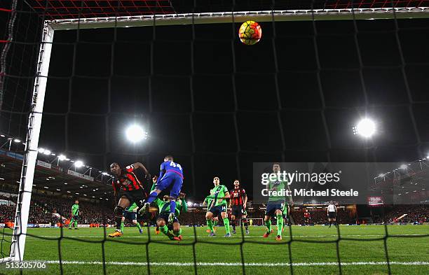 Benik Afobe of Bournemouth heads the ball to score his team's second goal past Fraser Forster of Southampton during the Barclays Premier League match...