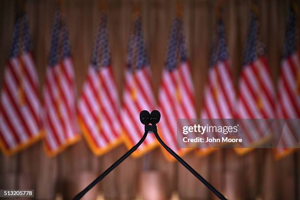 Microphones await the arrival of Republican Presidential frontrunner Donald Trump at the Mar-A-Lago Club on March 1, 2016 in Palm Beach, Florida....