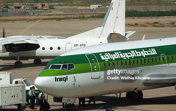 An Iraqi Airways Boeing 737 sits on the tarmac at Baghdad International Airport September 18, 2004 Baghdad, Iraq. National carrier Iraqi Airways...