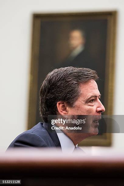 Director James Comey testifies before a House Judiciary Committee Hearing on Apple's denial of the FBI's request to provide a way to hack into one of...