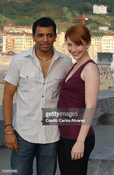 Director M. Night Shyamalan and actress Bryce Dallas Howard attend the Photocall for their movie "The Village" on the second day of the 52nd San...