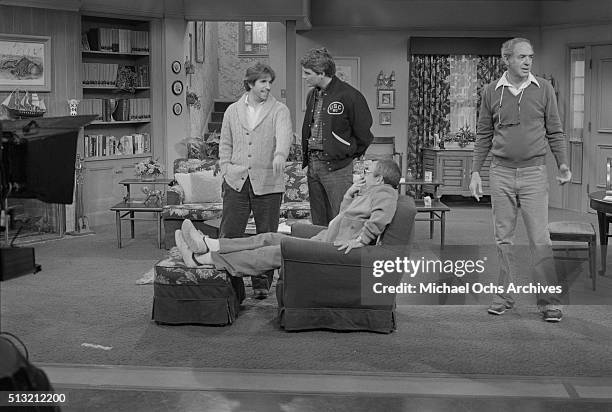 Henry Winkler , Ted McGinley and Tom Bosley rehearse on the set of 'Happy Days' at Paramount Studios on March 5, 1981 in Los Angeles, California.