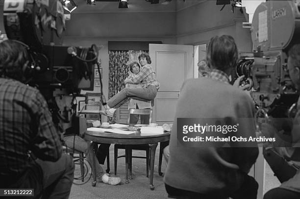 Henry Winkler and Scott Baio rehearse on the set of 'Happy Days' at Paramount Studios on March 5, 1981 in Los Angeles, California.
