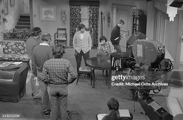 Henry Winkler , Scott Baio and Ted McGinley rehearse on the set of 'Happy Days' at Paramount Studios on March 5, 1981 in Los Angeles, California.
