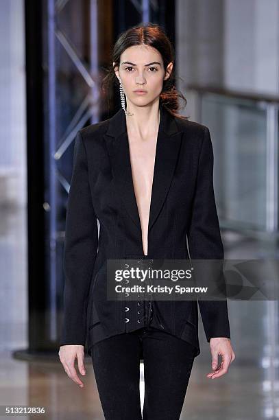 Model walks the runway during the Anthony Vaccarello show as part of Paris Fashion Week Womenswear Fall/Winter 2016/2017 on March 1, 2016 in Paris,...