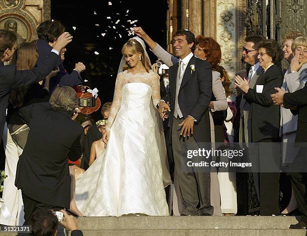 Carlo Ponti Jr leaves St. Stephen's Basilica with his wife Andrea Meszaros after their marriage ceremony September 18, 2004 in Budapest, Hungary.