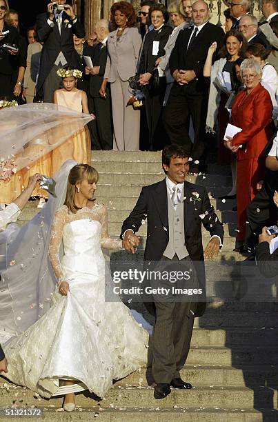 Carlo Ponti Jr leaves St. Stephen's Basilica with his wife Andrea Meszaros after their marriage ceremony September 18, 2004 in Budapest, Hungary.