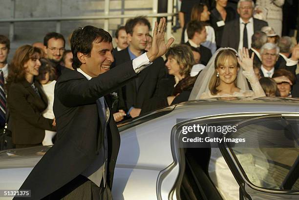 Carlo Ponti Jr leaves St. Stephen's Basilica with his wife Andrea Meszaros after their marriage ceremony September 18, 2004 in Budapest, Hungary.