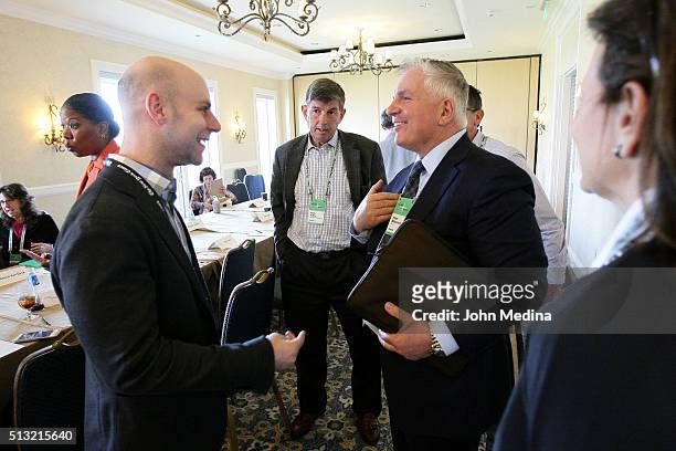 Adam Grant, Ph.D. , professor at Wharton School of Business, speaks to a guest during a breakout session during The New York Times New Work Summit on...