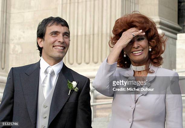 Carlo Ponti Jr leaves St. Stephen's Basilica with Sophia Loren September 18, 2004 in Budapest, Hungary.