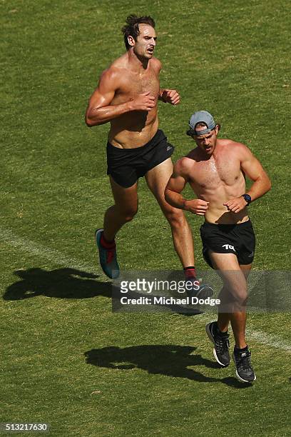 Travis Colyer overtakes Jobe Watson in the dying stages of their last 1km time trial during a training session at St. Bernard's College on March 2,...