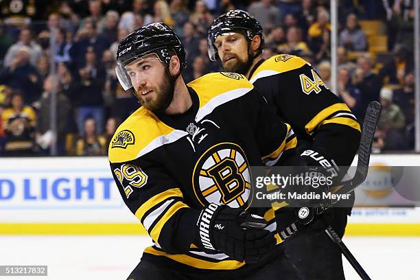 Landon Ferraro of the Boston Bruins celebrates after scoring a goal against the Calgary Flames during the first period at TD Garden on March 1, 2016...