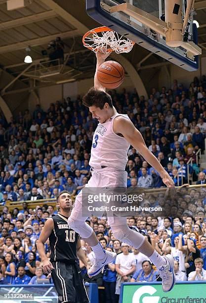 Grayson Allen of the Duke Blue Devils dunks against Mitchell Wilbekin of the Wake Forest Demon Deacons during their game at Cameron Indoor Stadium on...