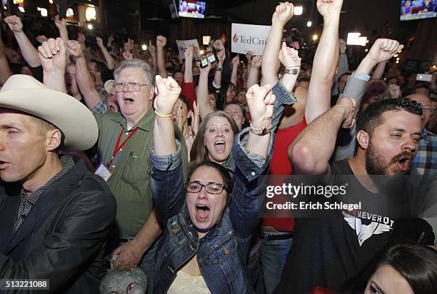 Supporters of Republican presidential candidate, Sen. Ted Cruz celebrate at a Super Tuesday watch party at the Redneck Country Club March 1, 2016 in...
