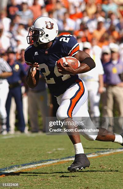 Carnell Williams of the Auburn Tigers runs against the LSU Tigers in a game on September 18, 2004 at Jordan-Hare Stadium in Auburn, Alabama.