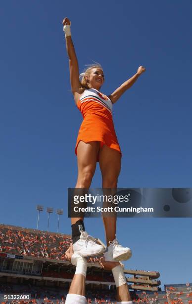 An Auburn Tigers Cheerleader gets the crowd ready for the game against the LSU Tigers in a game on September 18, 2004 at Jordan-Hare Stadium in...